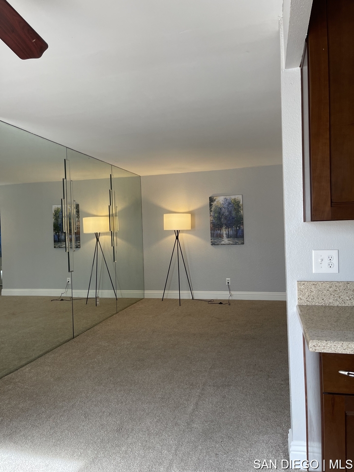 https://sdmls-assets.cdn-connectmls.com/pics/12F08314186F43F9E0636110000A541E/HD_1709668847367_living_room_looking_from_kitchen__scaled.JPEG