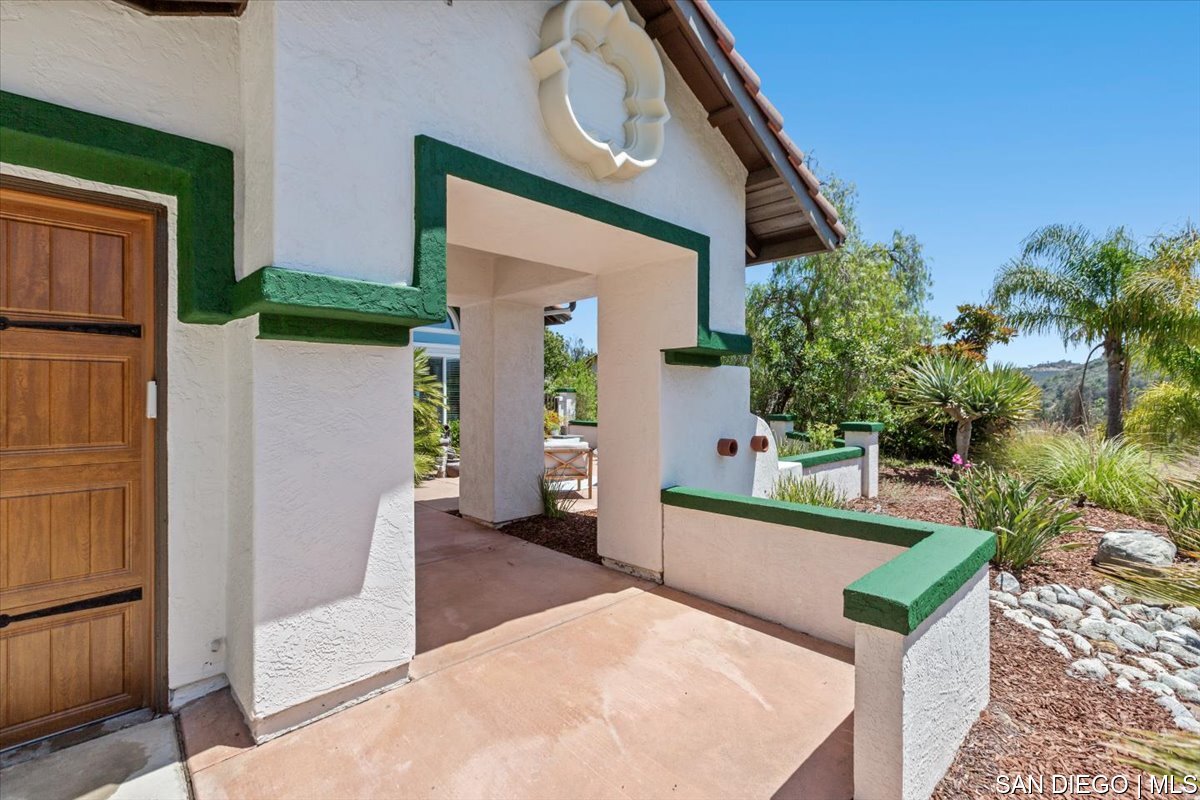 https://sdmls-assets.cdn-connectmls.com/pics/335F04EBBF4A9611E0633111000AF8B3/HD_1745333335396_05_Front_Walkway.JPEG