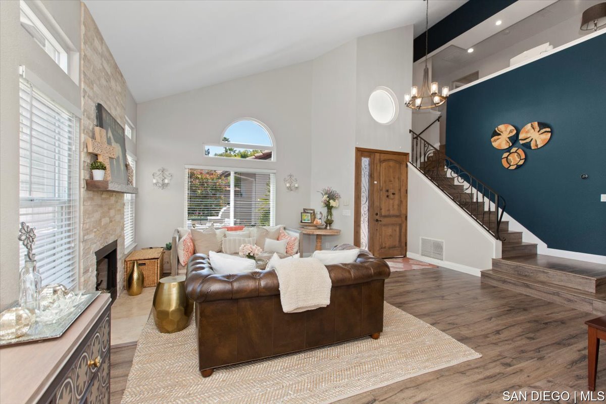 https://sdmls-assets.cdn-connectmls.com/pics/335F04EBBF4A9611E0633111000AF8B3/HD_1745333356185_13_Living_Room.JPEG