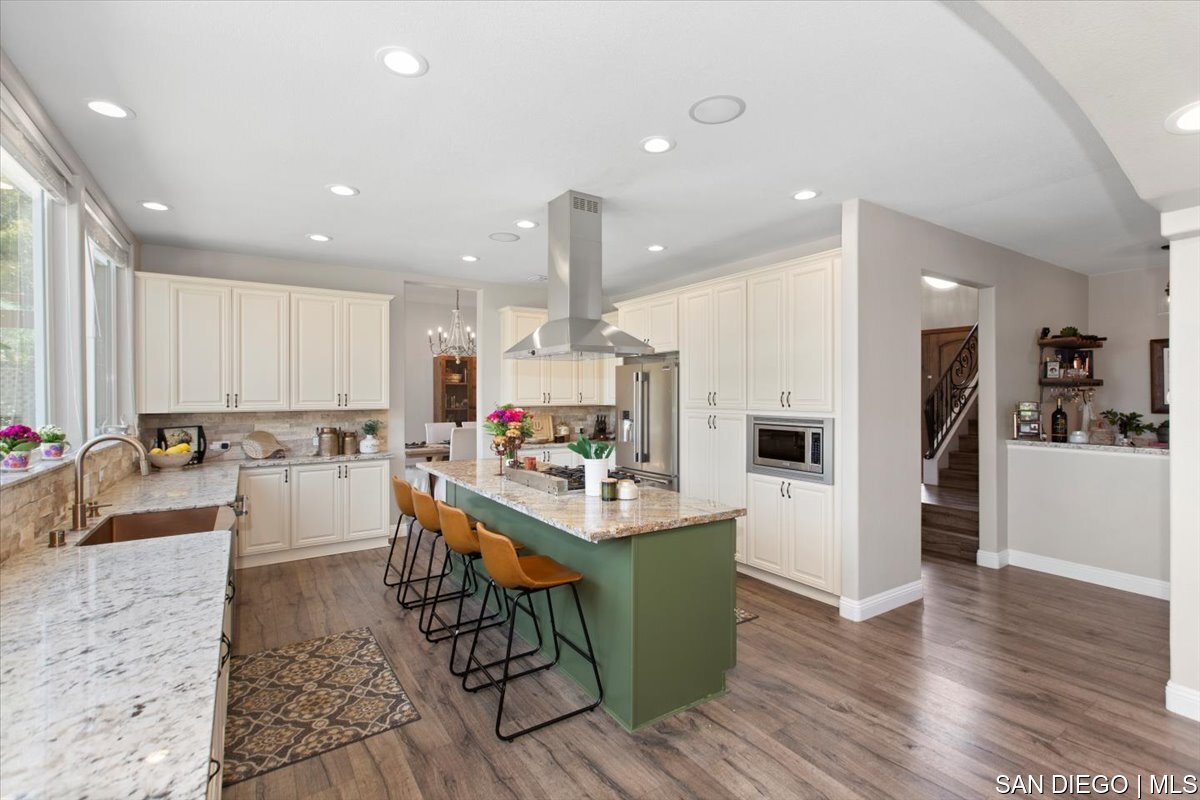 https://sdmls-assets.cdn-connectmls.com/pics/335F04EBBF4A9611E0633111000AF8B3/HD_1745333366661_19_Kitchen.JPEG