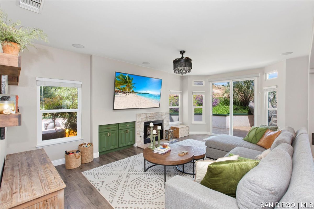 https://sdmls-assets.cdn-connectmls.com/pics/335F04EBBF4A9611E0633111000AF8B3/HD_1745333367496_22_Family_Room.JPEG