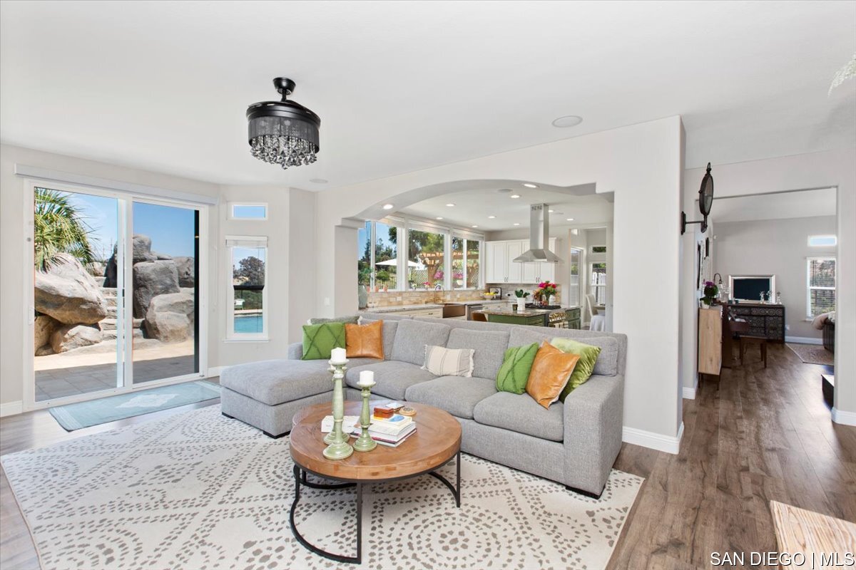 https://sdmls-assets.cdn-connectmls.com/pics/335F04EBBF4A9611E0633111000AF8B3/HD_1745333368232_23_Family_Room.JPEG