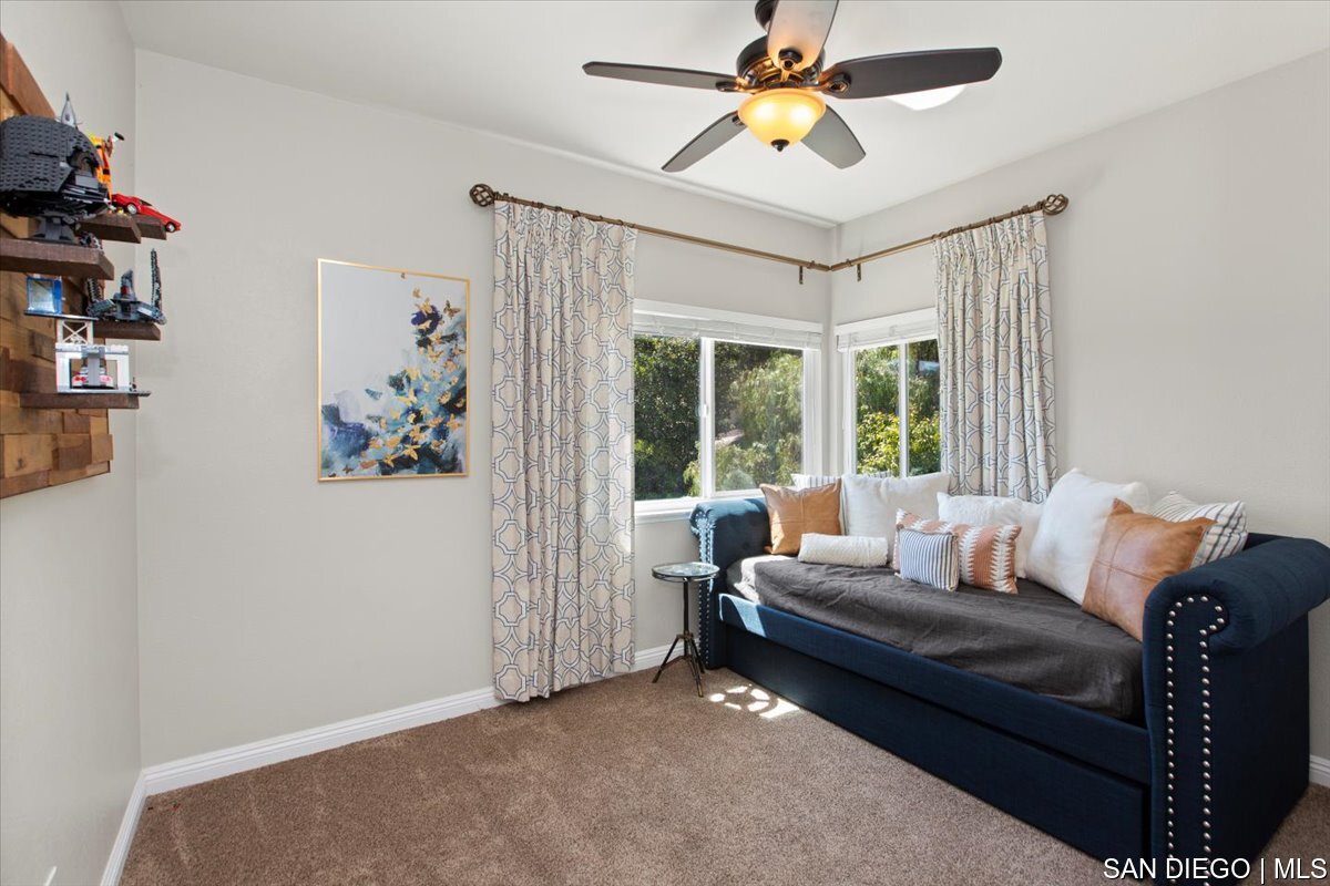 https://sdmls-assets.cdn-connectmls.com/pics/335F04EBBF4A9611E0633111000AF8B3/HD_1745333390021_34_Bedroom.JPEG