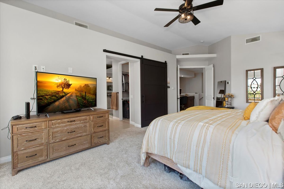 https://sdmls-assets.cdn-connectmls.com/pics/335F04EBBF4A9611E0633111000AF8B3/HD_1745333390366_38_Primary_Bedroom.JPEG