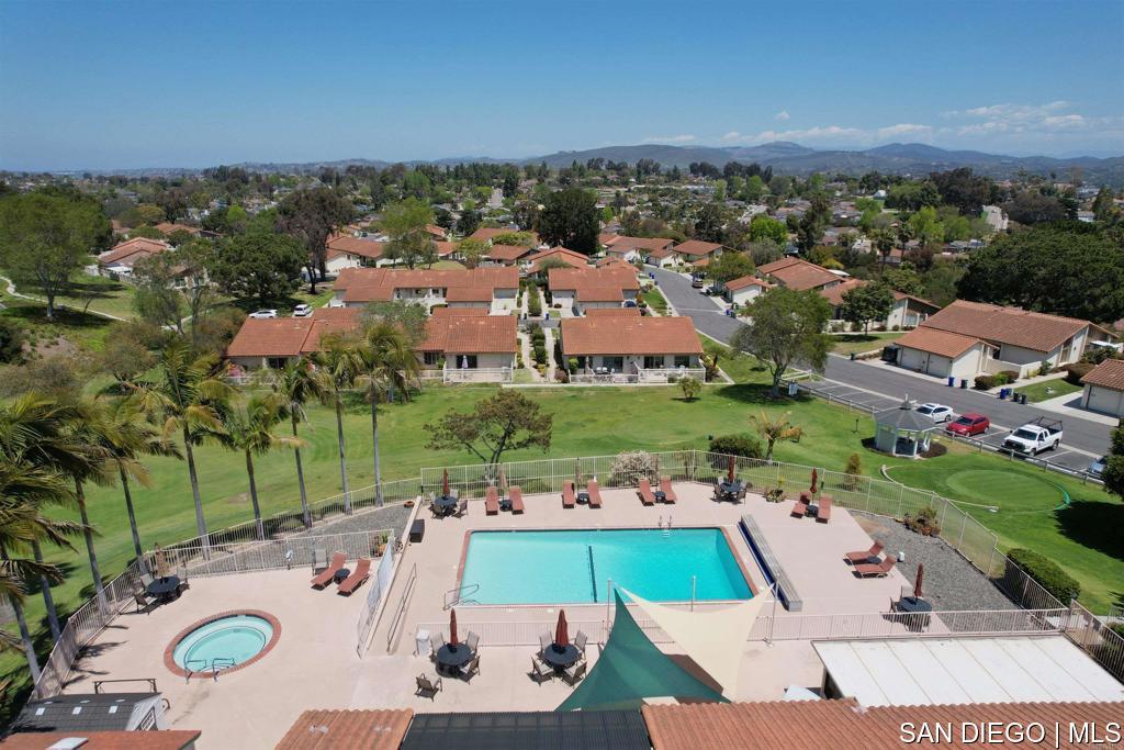 https://sdmls-assets.cdn-connectmls.com/pics/3818E63DE70586A7E0634411000A2FD9/HD_1750536944537_POOL_SPA.JPEG