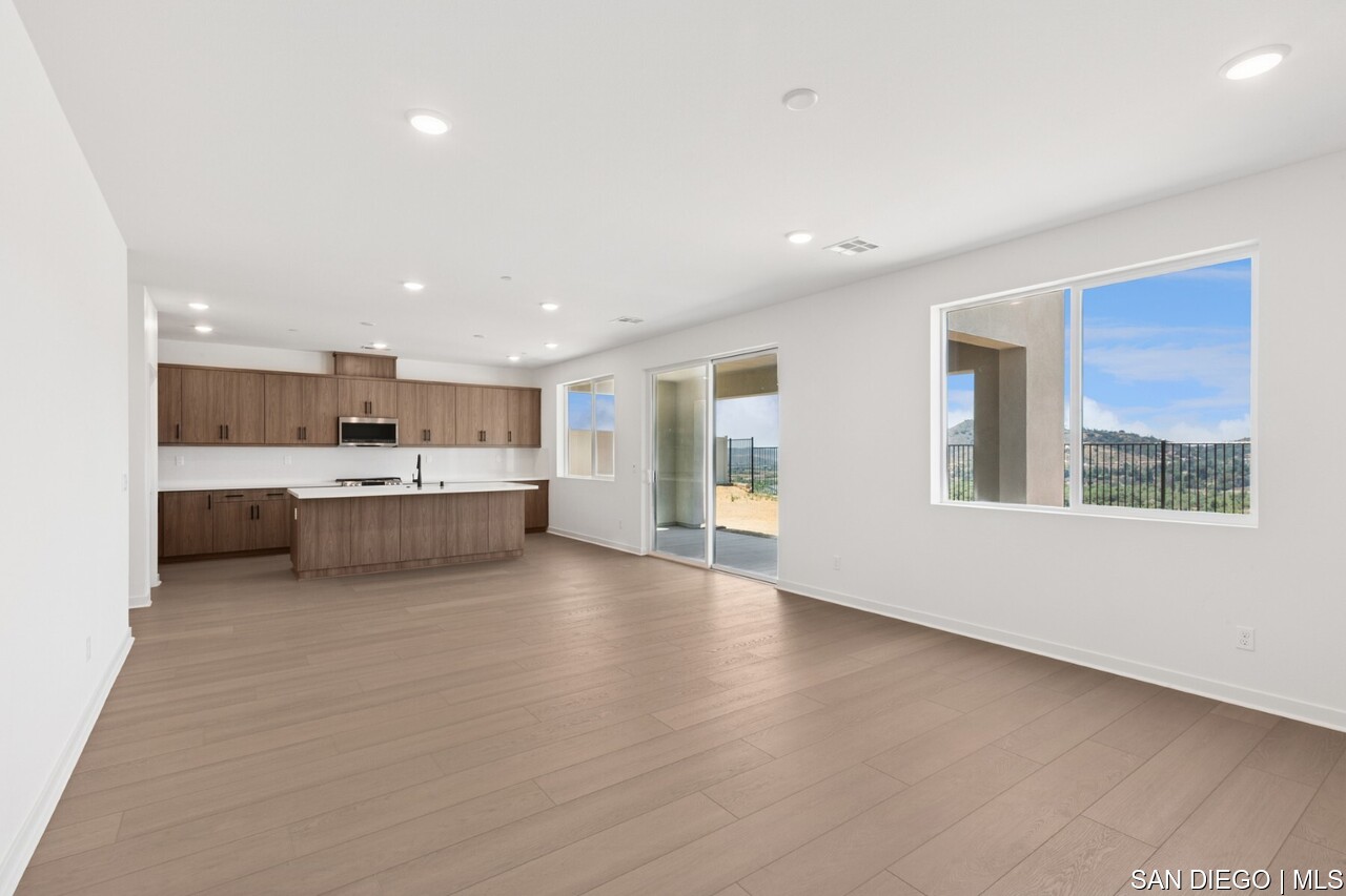 https://sdmls-assets.cdn-connectmls.com/pics/399E1EC4F628488EE0636E11000A3FED/HD_1752205732161_Pomelo_632MEADOWOODST_HDR_none21.JPEG