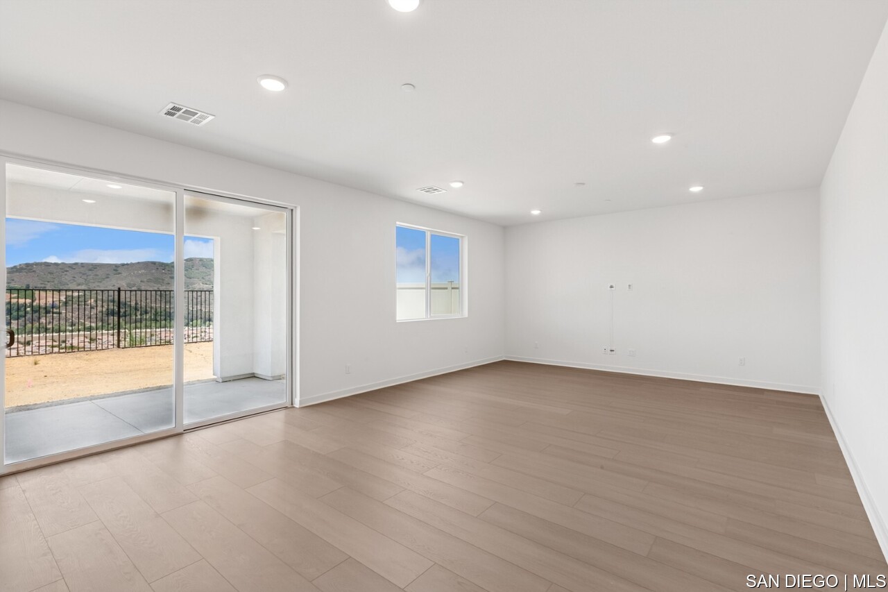 https://sdmls-assets.cdn-connectmls.com/pics/399E1EC4F628488EE0636E11000A3FED/HD_1752205841681_Pomelo_632MEADOWOODST_HDR_none38.JPEG