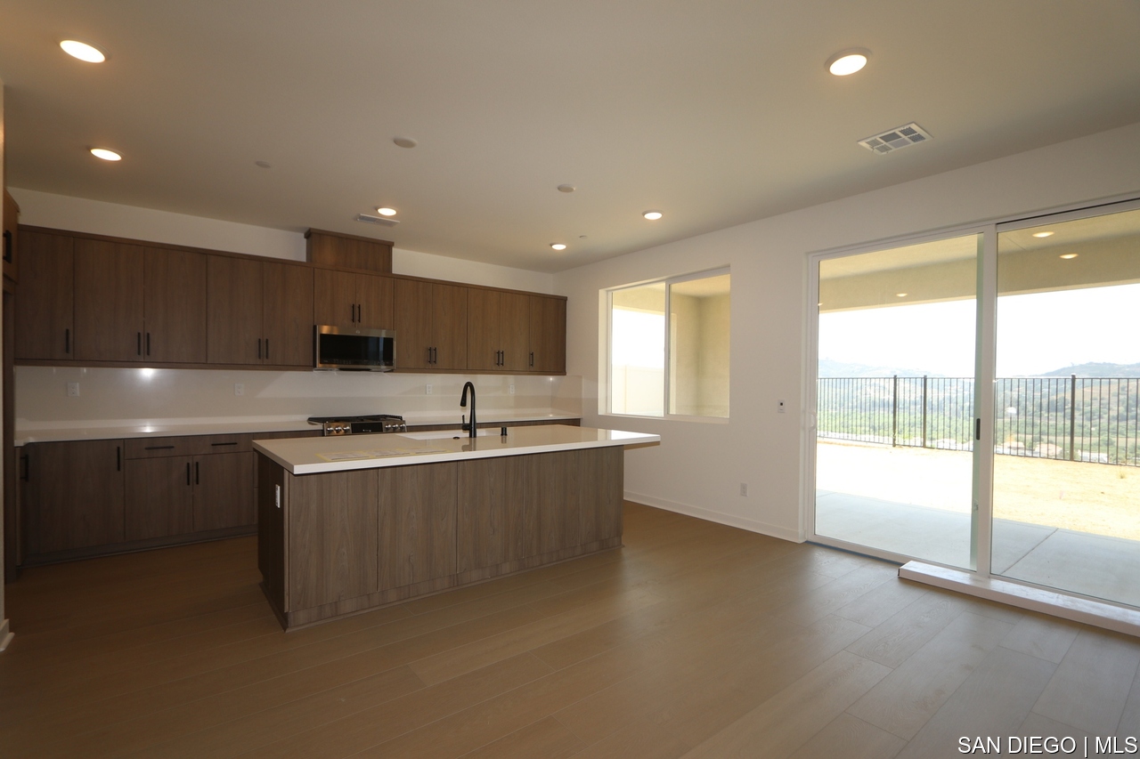 https://sdmls-assets.cdn-connectmls.com/pics/399E1EC4F628488EE0636E11000A3FED/HD_1752205841836_Pomelo_632MEADOWOODST_I.Finish_none46.JPEG