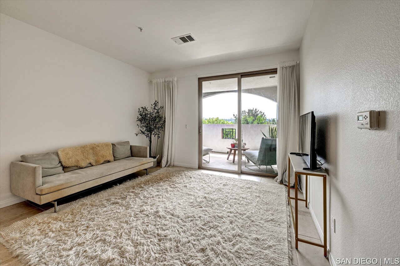 https://sdmls-assets.cdn-connectmls.com/pics/39E8244E56DD139FE0636E11000A153B/HD_1752536452403_11_3877_Pell_place_Unit_118_11.JPEG