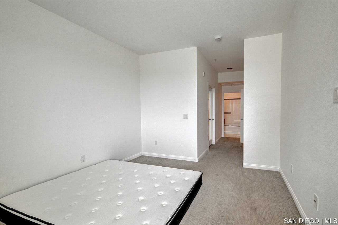 https://sdmls-assets.cdn-connectmls.com/pics/39E8244E56DD139FE0636E11000A153B/HD_1752536453410_20_3877_Pell_place_Unit_118_20.JPEG