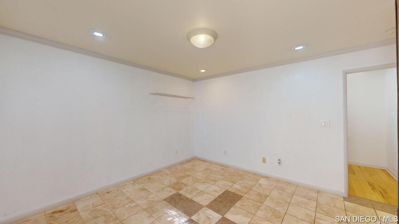 https://sdmls-assets.cdn-connectmls.com/pics/3C1F02DA71EAF82EE0639F13000AECE5/HD_1755009545930_1876_E_12th_St_National_City_CA_91950_07312025_174412.JPEG