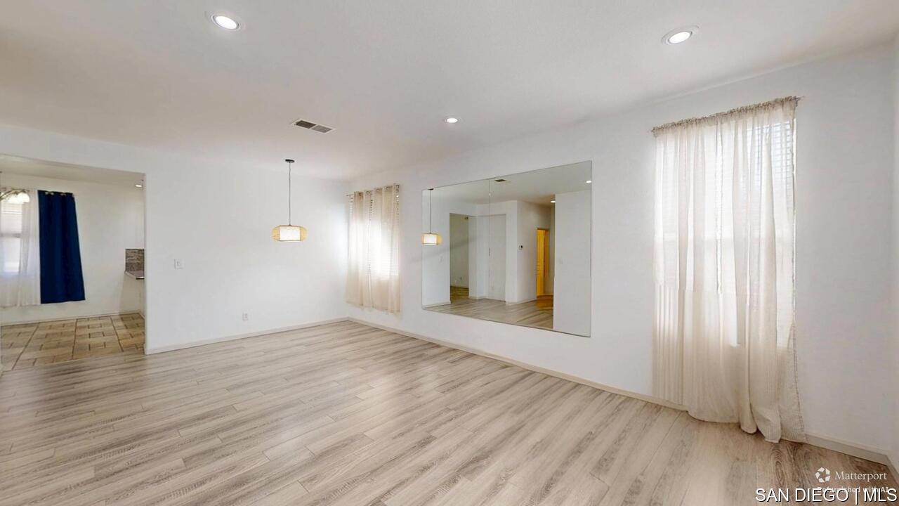 https://sdmls-assets.cdn-connectmls.com/pics/3C1F02DA71EAF82EE0639F13000AECE5/HD_1755009550991_1876_E_12th_St_National_City_CA_91950_07312025_174647_defurnished.JPEG