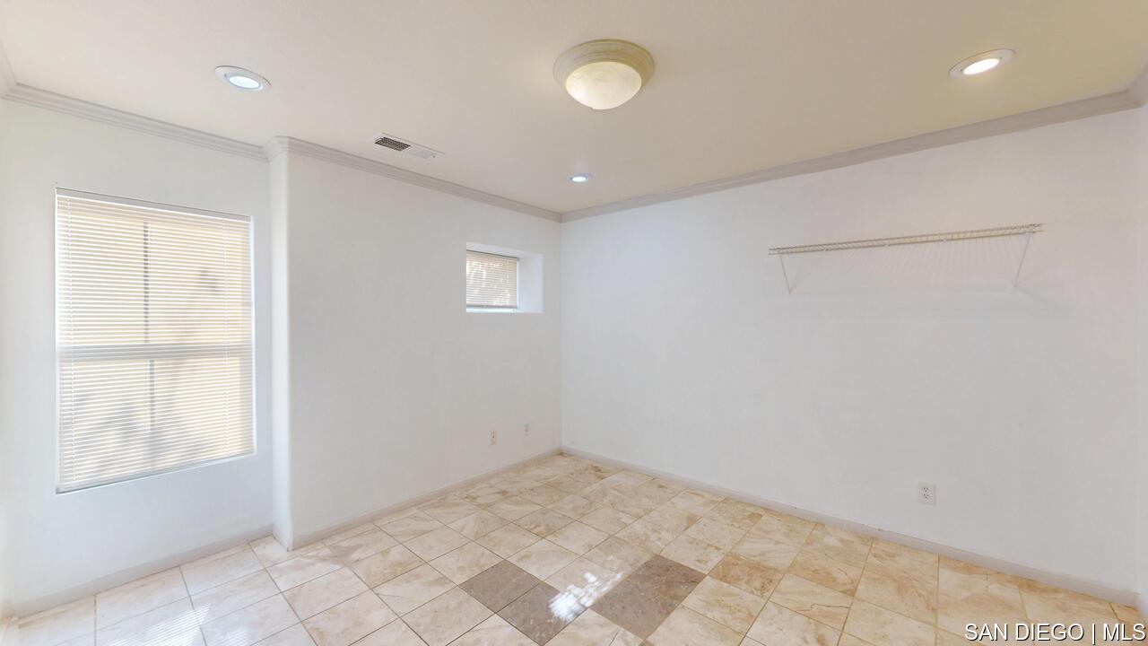 https://sdmls-assets.cdn-connectmls.com/pics/3C1F02DA71EAF82EE0639F13000AECE5/HD_1755009551572_1876_E_12th_St_National_City_CA_91950_07312025_174354.JPEG