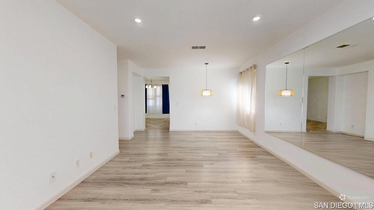 https://sdmls-assets.cdn-connectmls.com/pics/3C1F02DA71EAF82EE0639F13000AECE5/HD_1755009551913_1876_E_12th_St_National_City_CA_91950_07312025_174700_defurnished.JPEG