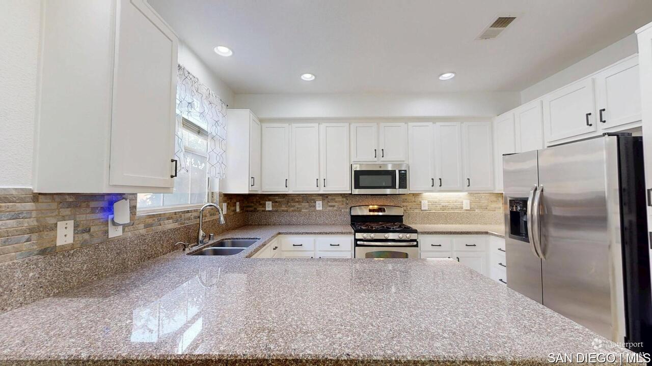 https://sdmls-assets.cdn-connectmls.com/pics/3C1F02DA71EAF82EE0639F13000AECE5/HD_1755009552420_1876_E_12th_St_National_City_CA_91950_07312025_174732_defurnished.JPEG