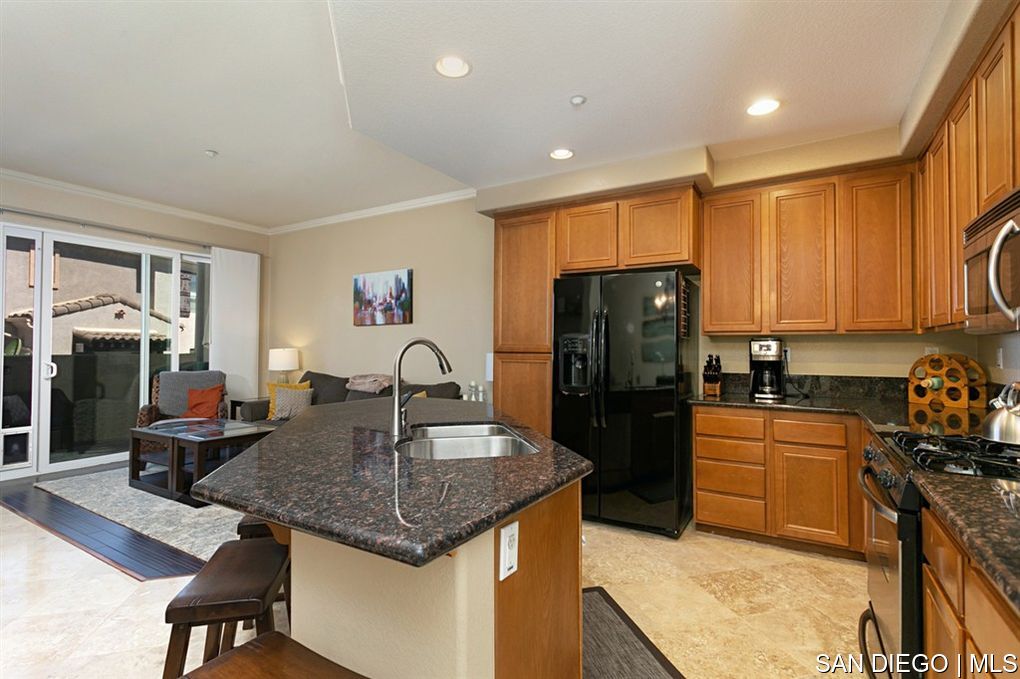 https://sdmls-assets.cdn-connectmls.com/pics/D24503C7E6D4BEC9E0535E10000A0D3F/HD_1638586994646_751_Almond_Kitchen___3.JPEG