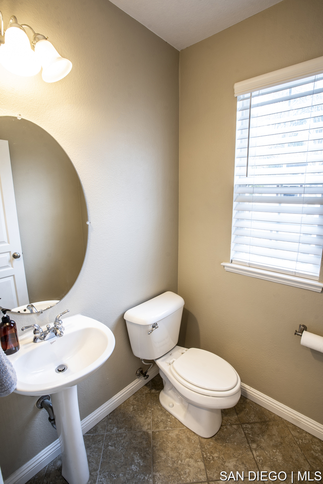 https://sdmls-assets.cdn-connectmls.com/pics/F968354220086F7EE0535F10000A1ECD/HD_1681675680916_powder_room.JPEG