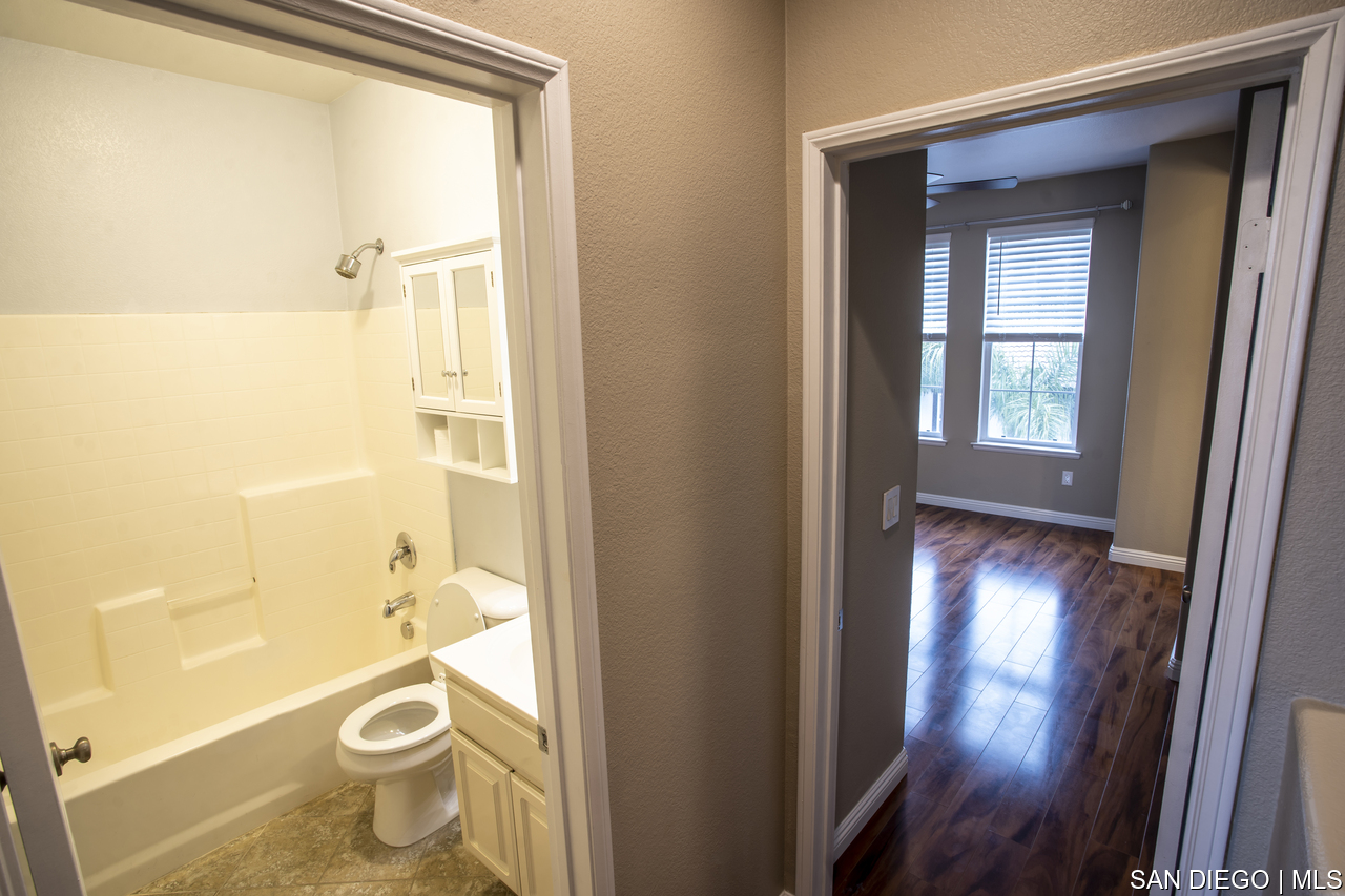 https://sdmls-assets.cdn-connectmls.com/pics/F968354220086F7EE0535F10000A1ECD/HD_1681675801498_bath_to_master.JPEG